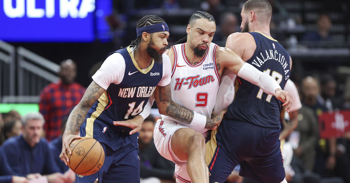 Houston Rockets forward Dillon Brooks defends New Orleans Pelicans forward Brandon Ingram